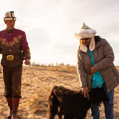 An Azat Tours guide with a Taigan sighthound