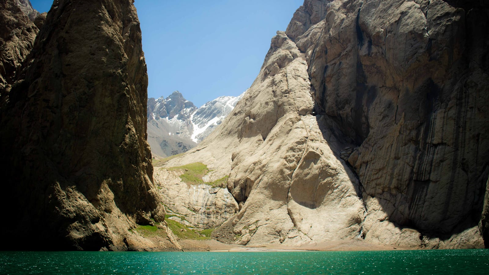 A canyon with turquoise water in the Kyrgyz mountains